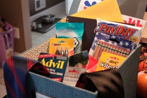 Since he will be traveling more to hotels- advil, new ties and lots of goodies